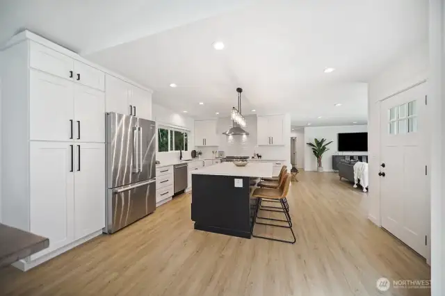 Plenty of room in this open concept kitchen, dining and living room.
