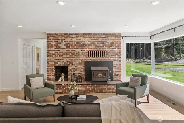 You will love this true brick feature wall with wood burning insert for those upcoming cool fall & winter days.