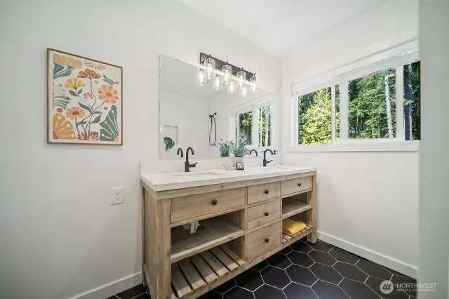 Main bath convenient to both bedroom 2 & 3. You love the chosen hard surfaces.