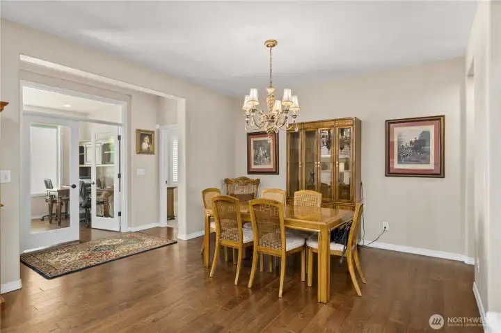 Ample dining area and French doors to the den.