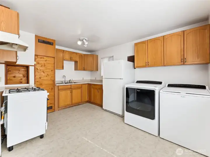 The kitchen includes dining space. All appliances stay.