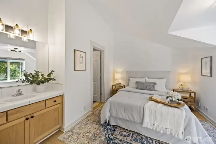 Top level bedroom with attached bathroom including WC/shower room