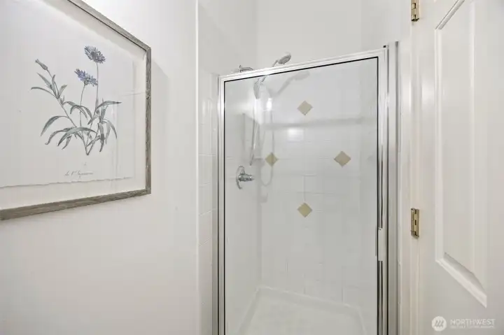 Top level bedroom with attached bathroom including WC/shower room