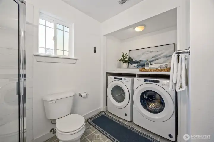 Lower level 3/4 bathroom with laundry