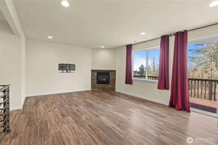 Good sized open area with a deck to the outside