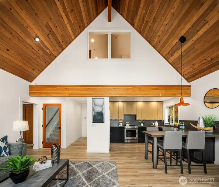 Gorgeous cedar ceiling perfectly balances the space.  Stunning wood beam