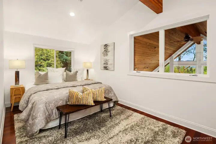 Primary bedroom with new wood floors and BIG views