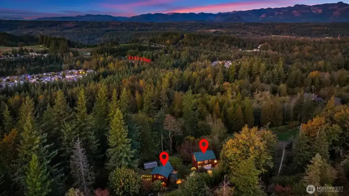 Privacy and acreage, yet minutes to amenities.  6 minute walk to Fischer Creek Park on the Ridge.