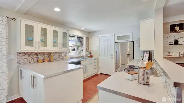 Additional cabinetry offers plenty of storage for everyday essentials.