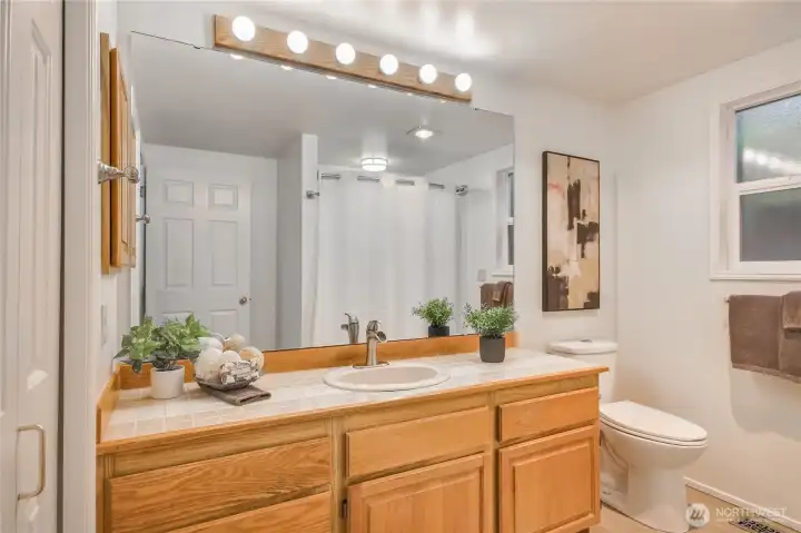 Hall / Guest full bath with bath tub / Shower combo.