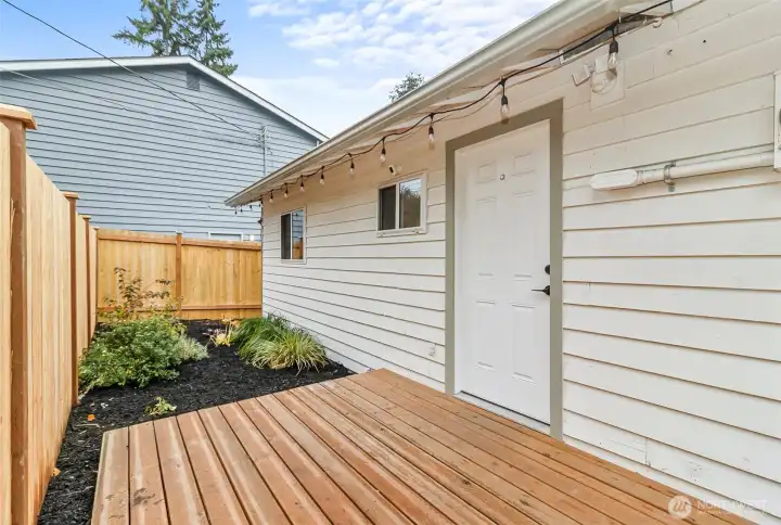 The view of the back door straight from the kitchen/dining area. Perfect place for the BBQ
