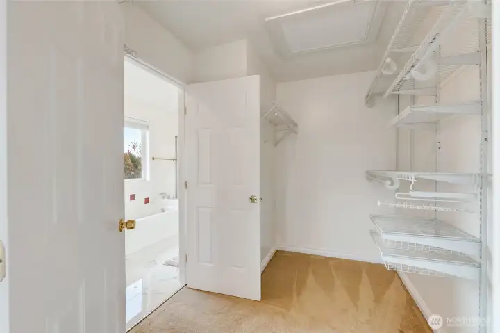 Primary bedroom walk-closet, also connected to bathroom