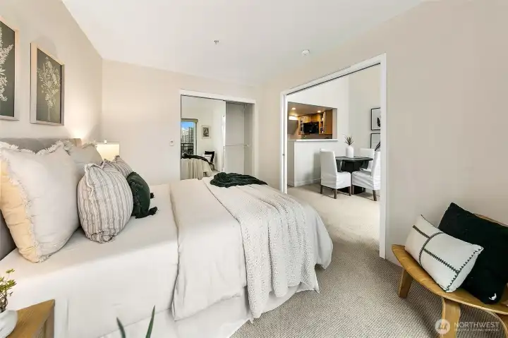 Main floor bedroom is spacious and situated off of the living area for flexible use.