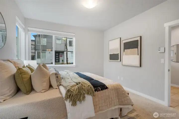 Lower level bedroom with its own bathroom.