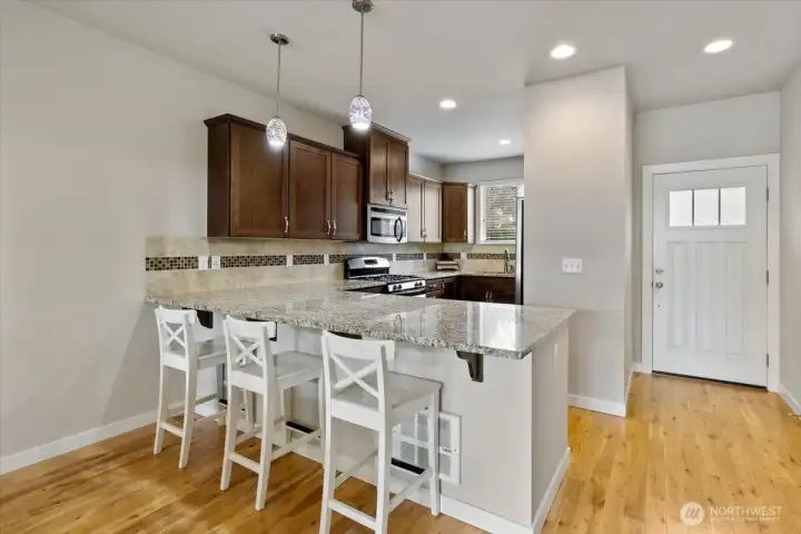 Energy efficient gas cooktop range