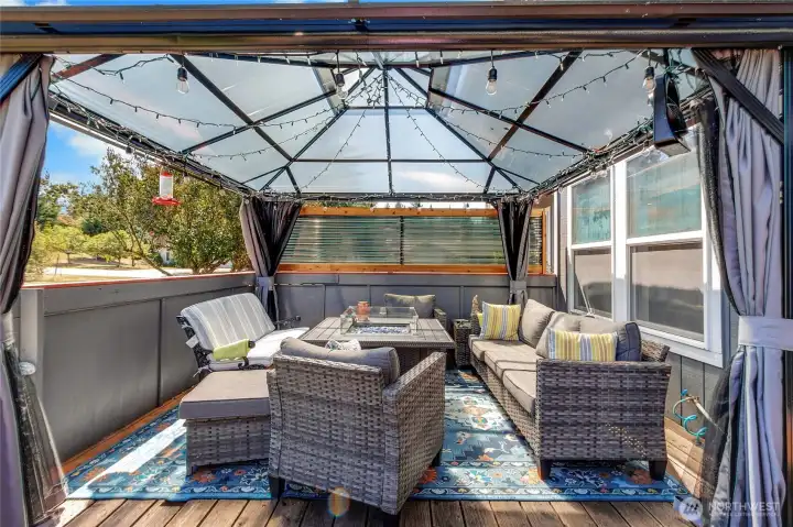 Back patio covered gazebo for relaxing anytime of the year.