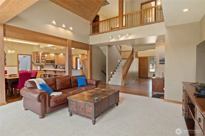 Soaring ceilings with beautiful tongue-and-groove detail add warmth and character.