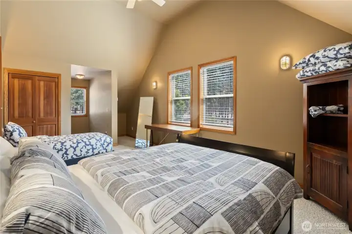 One of two spacious guest bedrooms upstairs, perfect for family or friends.