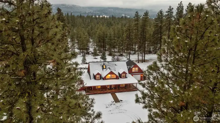 Tucked among the trees, this welcoming home blends peaceful surroundings with easy convenience.