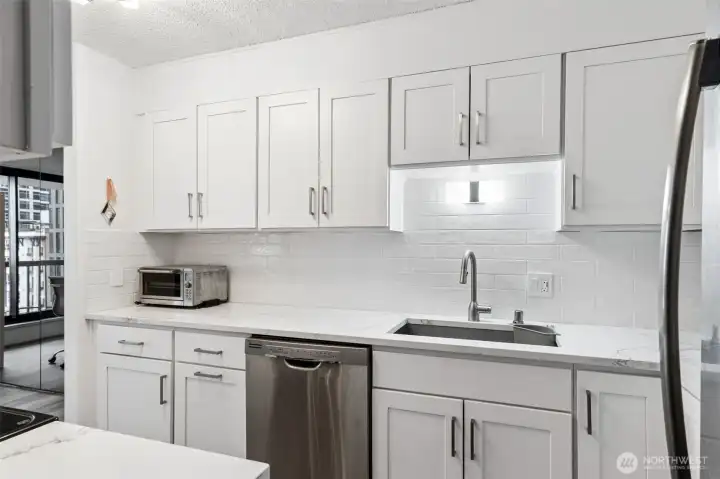 Perfectly new, white & ready for the next chef to join the building.