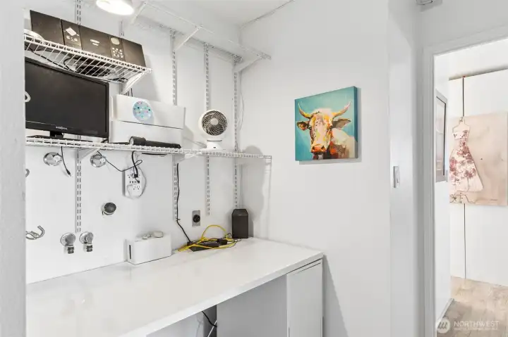 This room is being used as an office but has the washer & dryer connections and could be a laundry room within the unit. This building also offers a free laundry on same floor at this unit + every other floor.