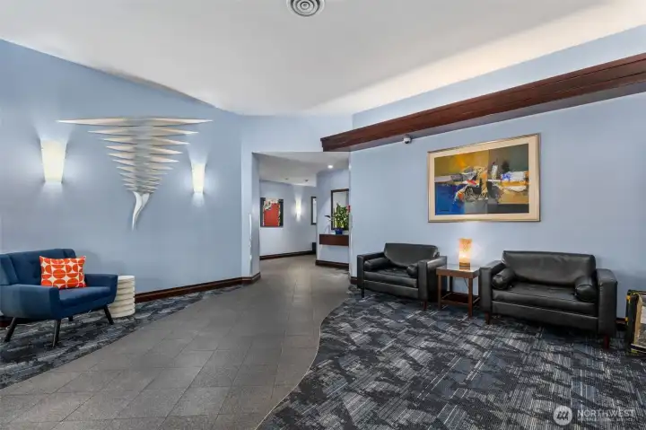 Lobby entrance includes Amazon lockers, mailboxes and elevators