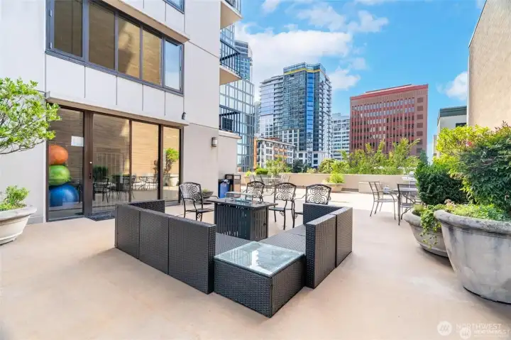 Plenty of room for entertaining a large crowd on this deck just off the gym & pool area.