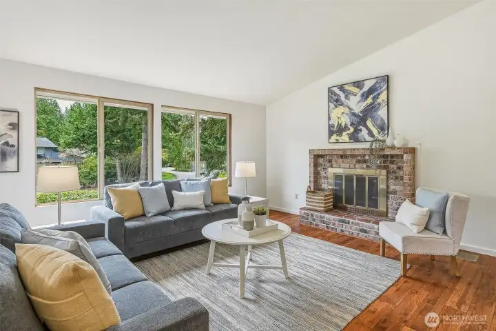 Vaulted ceilings and large, south-facing windows create a spacious, airy feel.