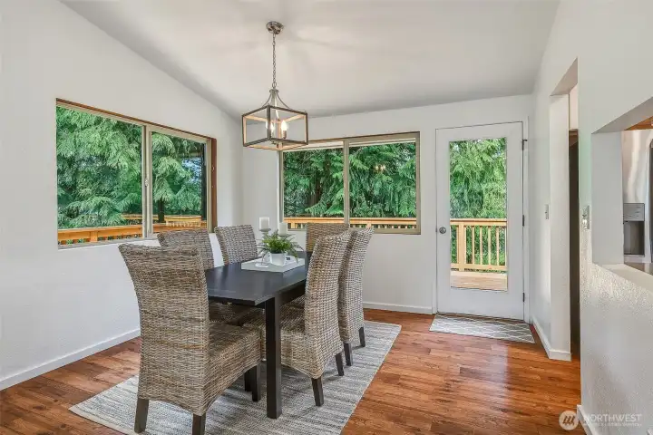 Dining room with direct access to the wraparound deck.