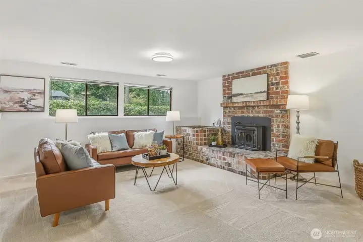 Downstairs Family Room has a wood burning stove with an insert. Great if the power goes out!