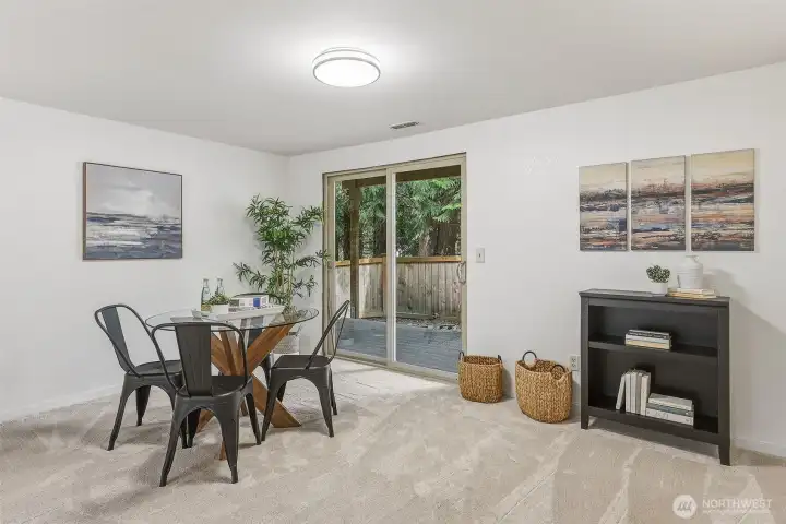 Downstairs Family Room has a slider to the backyard