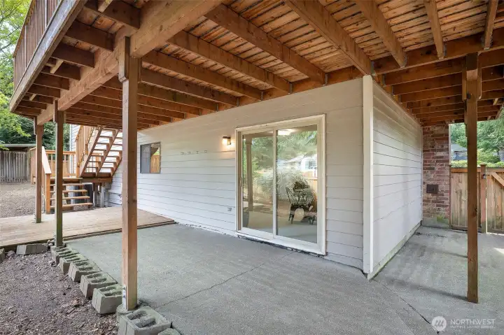 Downstairs patio. Notice how the deck is L-shaped. Fully fenced backyard, gate with access to the front yard