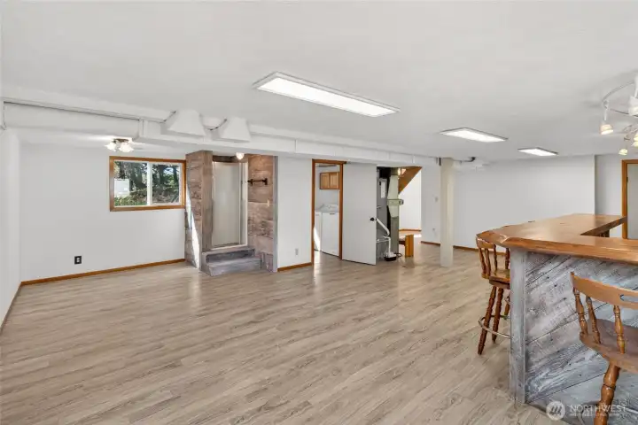 Ground floor entertaining space with shower, bathroom and laundry!