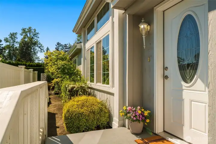 Main entrance also has access to the back yard area where you can create your own vision for gardens.