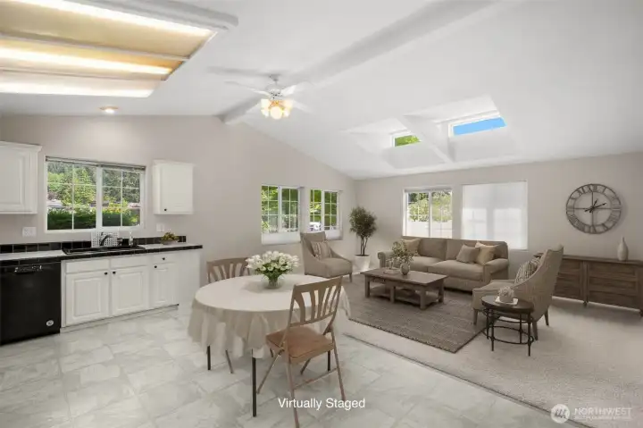 Virtually staged. Open concept kitchen and family room.