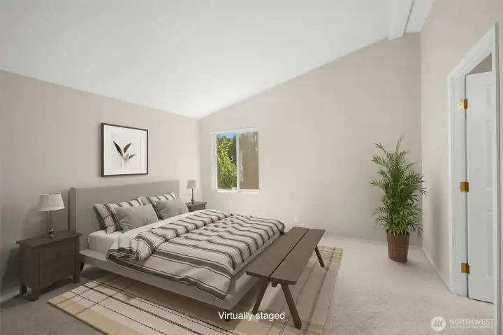 Virtually staged.  Primary bedroom with walk-in closet and large ensuite bath.