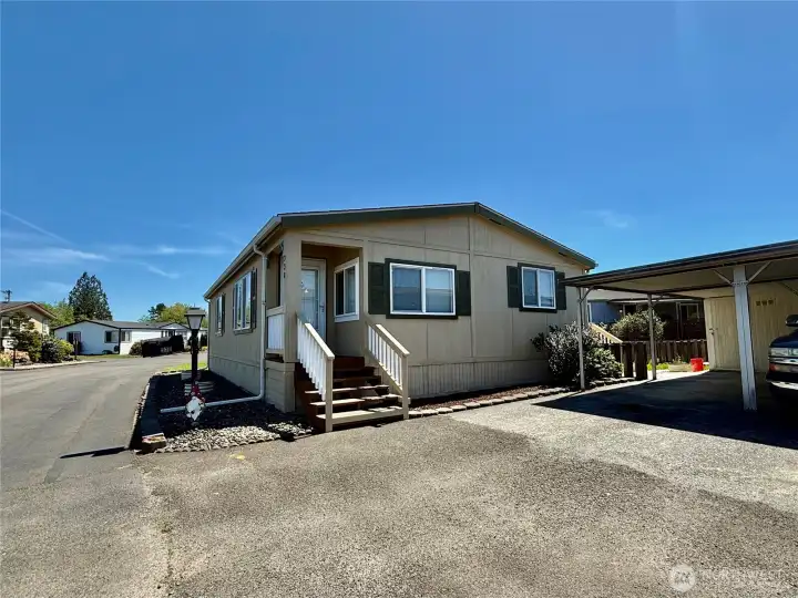 Front entry -Back has deck and shed that goes with sale