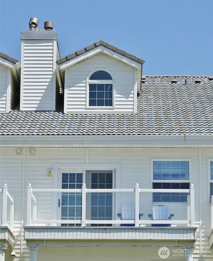 Rear view of #203 ~ currently used as a Vacation Rental. Rear view of #203 ~ currently used as a Vacation Rental.