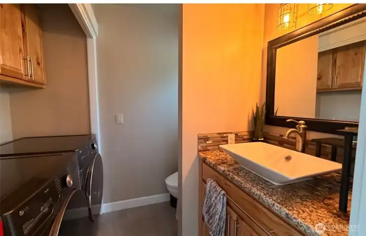 Utility Room & Powder Room off the entry.