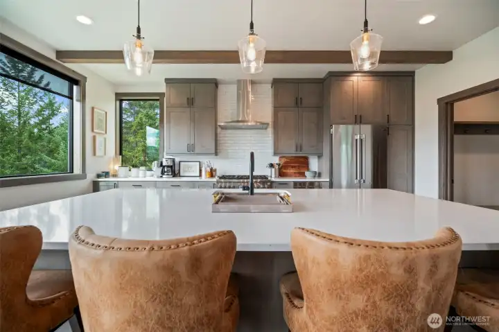 Perfect spot for your family and friends to sit and chat with you while you work your magic in the kitchen