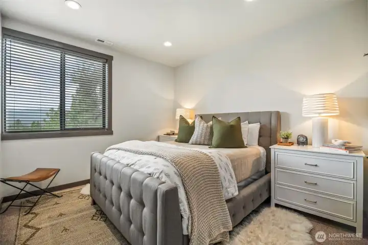 2nd upstairs bedroom enjoys a view and private access to the hall bathroom