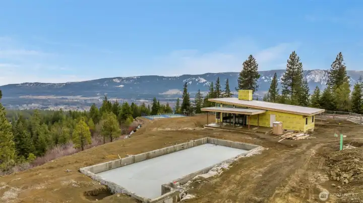 Scheduled for completion in 2026, a stunning contemporary clubhouse with a pool, pickleball courts, picnic area and other amenities