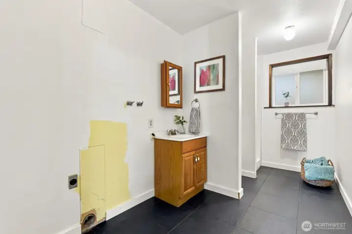 Laundry room with 3/4 bath