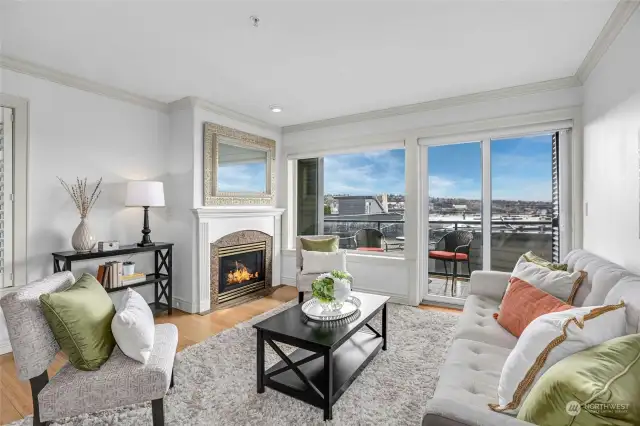 Gather around the lovely granite-surround gas fireplace.