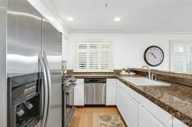 Granite surfaces + stainless-steel appliances including a newer 5-burner range!