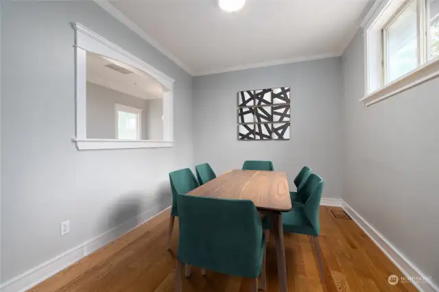 Virtually Staged Formal Dining room off kitchen