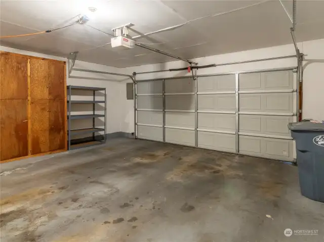 Large two car garage with additional closet and storage. Overhead garage door opener.