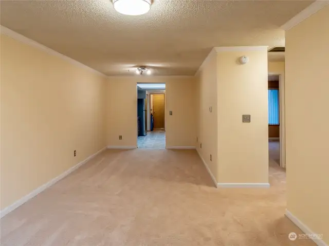 Taken from the living room with view into dining area and hallway to two bedrooms and bathroom.