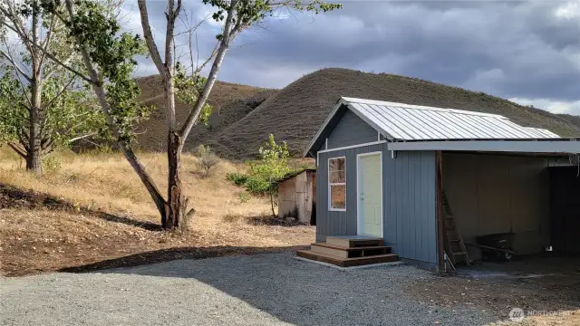 View of hills behind outbuilding