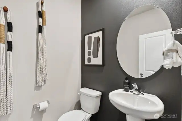 Cute powder room just beyond the foyer. Colors and options will vary. Photos from Model Home on 31. Homesite 45 is a mirror image.